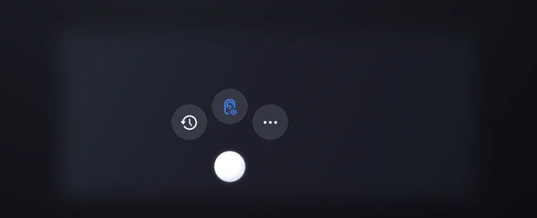 Three glass buttons fanned out over the pearl: history, auto-stop, and menu